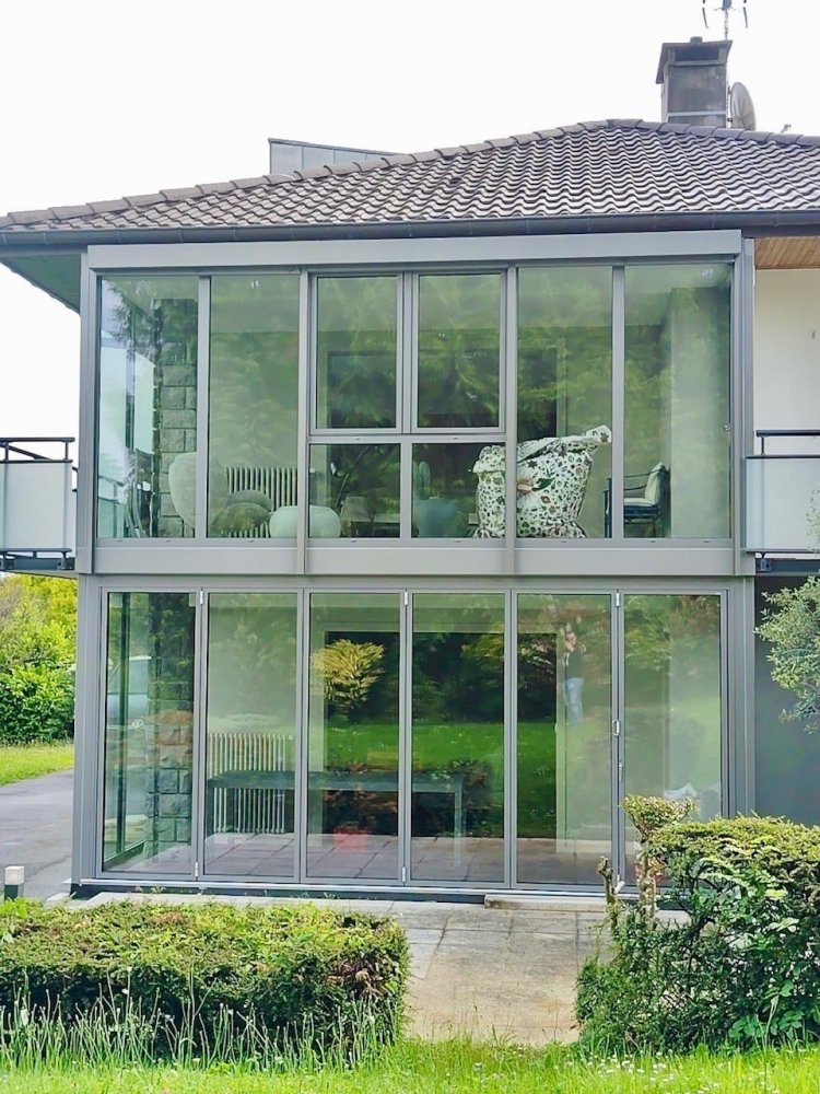 Mise en place d'une extension entièrement vitrée sur deux niveaux avec une magnifique vue sur le lac Léman (74)